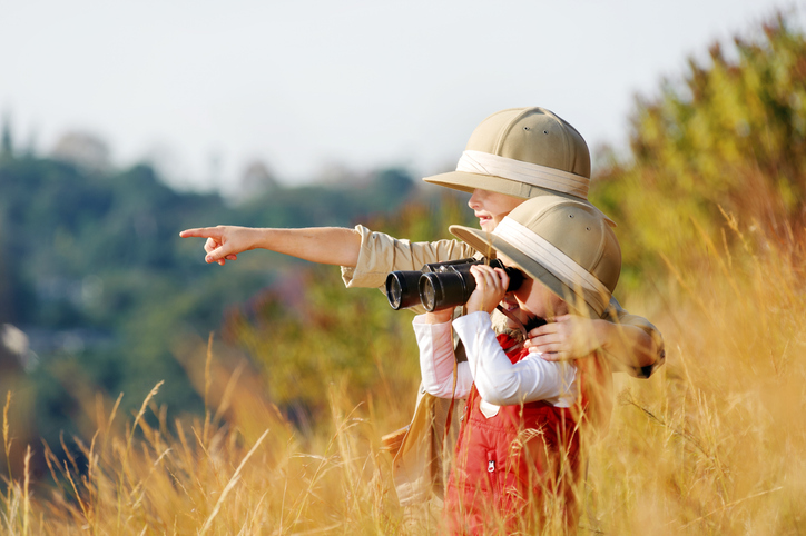 Children on safari with binoculars